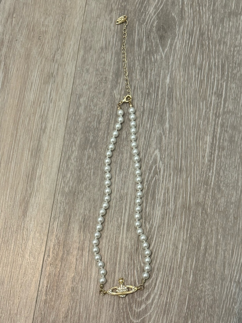 Vivienne Westwood White Pearl Necklace with Gold Orb Accent